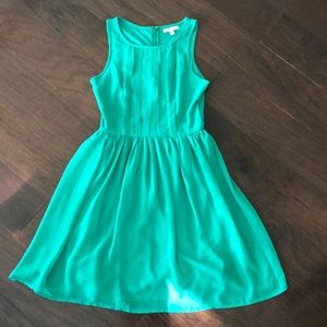 Delia’s green skater dress